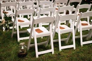 White Wooden Chairs on Green Grass Field
